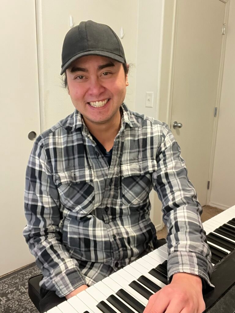 Scout, piano, guitar, and bass teacher with In Home Music Mentor