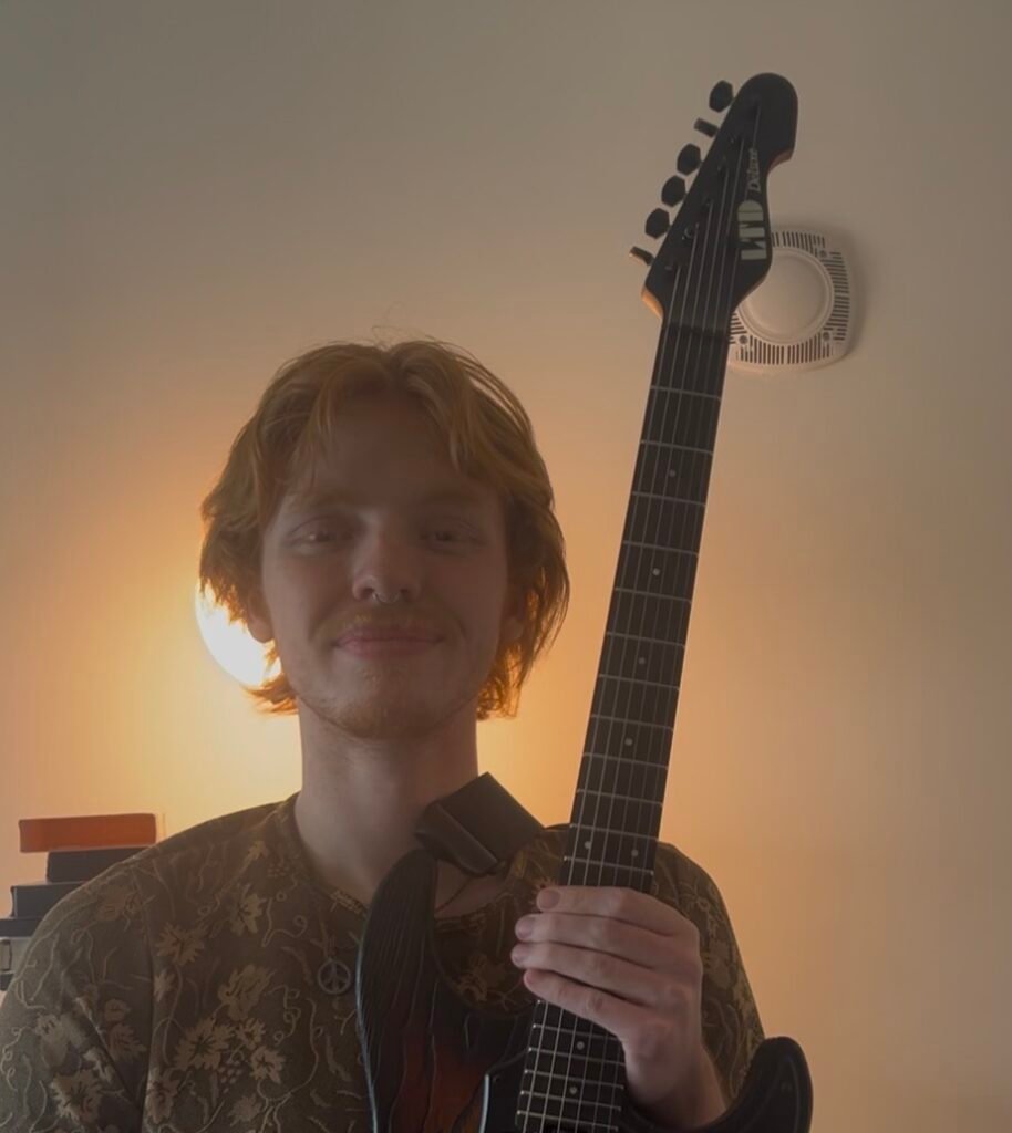 Desmond Burge, professional music instructor offering in-home piano, voice, and guitar lessons in Provo, Utah.