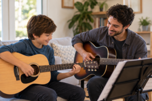 Young student learning acoustic guitar with an in-home guitar teacher in Charlotte, NC. Copy