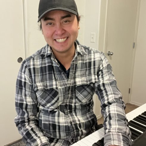 Scout, piano, guitar, and bass teacher with In Home Music Mentor